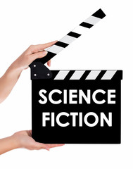 Obraz premium Hands holding a clapper board with SCIENCE FICTION text