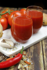 Raw Organic red Tomato Juice with salt, basil and bread