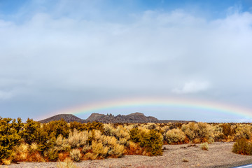 Rainbow in desert, California