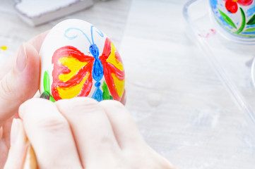 Easter egg painting with acrylic paints