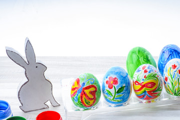 Easter bunny and colored eggs. Easter composition