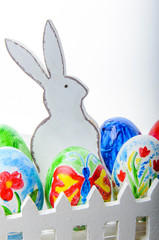 Easter composition with colorful Easter eggs and bunny