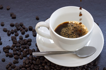 Hot coffee in a white cup