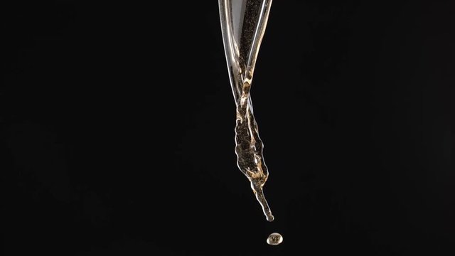 Pouring beer and making splash. Shot with high speed camera, phantom flex 4K. Slow Motion.