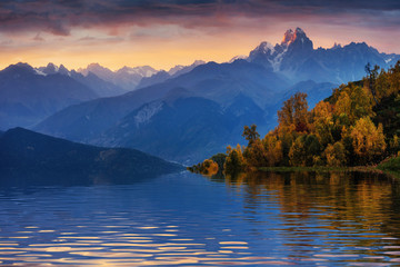 Sunset on mountain lake Koruldi. Upper Svaneti, Georgia, Europe.