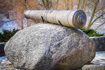 Medieval cannon on stone