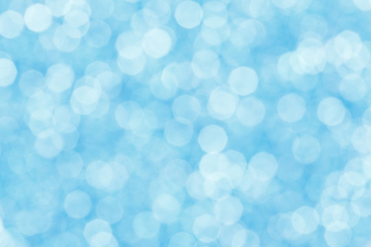 Abstract background blue bokeh circles for Christmas background.