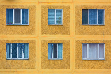 Vintage background wall with windows of a multistory building