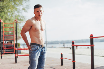 Strong young athlete engaged on the playground