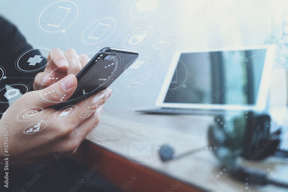 Aufkleber man hand using voip headset with digital tablet computer docking keyboard,smart phone,concept commun