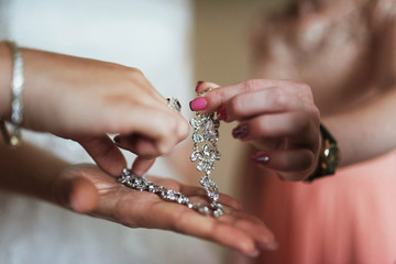 Elegant luxury wedding rings on a female hand