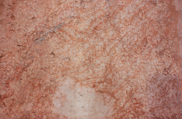 Ancient  surface of the Orange, natural, pink marble