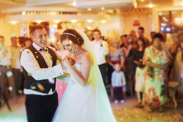 Happy bride and groom their first dance