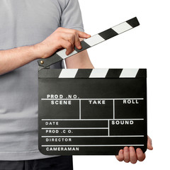 Close-up of man holding blank clapper board isolated on white