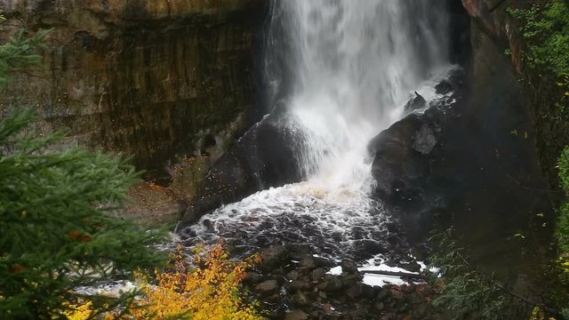 Miners Falls, a tall and powerful waterfall in Pictured Rocks National Lakeshore near Munising, Michigan, splashes down in this seamlessly looping video footage.