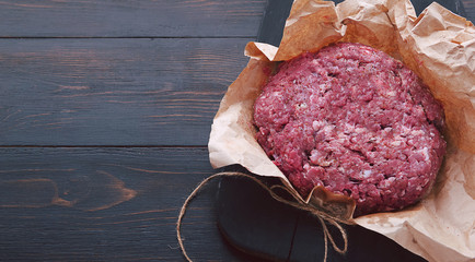 ground beef in a paper bag on the table