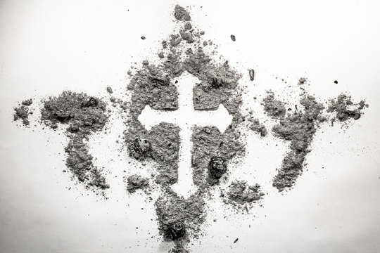 Christian cross drawing silhouette made in ash, dust, dirt as ash wednesday holiday, old vintage religion symbol concept background