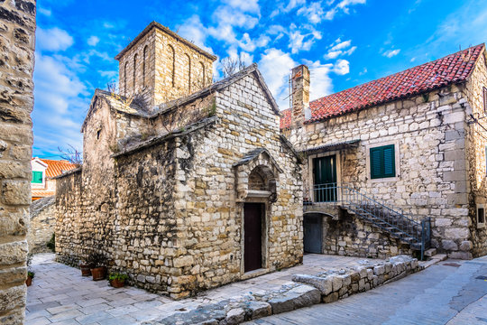 Old stone chapel Dalmatia. / Scenic view at old stone architecture in Dalmatia region, croatian travel places.