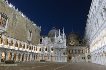 Courtyard inside the Doges palace at night in Venice, Italy.