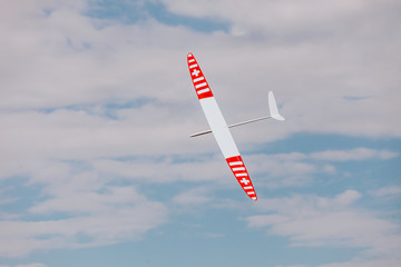 RC soaring plane on blue sky