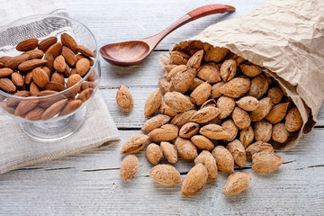 handful of almonds close up on linen material