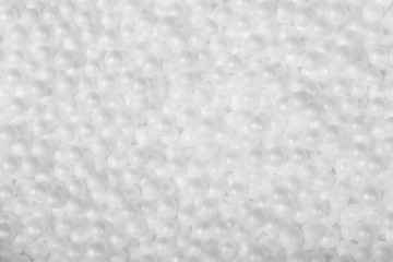 White styrofoam balls background. Close shot.