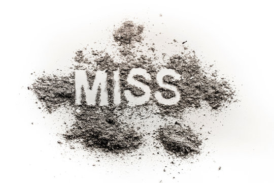 The word miss written in dirt, dust, ash as pageant, contest, girl, missing, lost person, grief, sorrow, paradox, fail, ugly, concept background