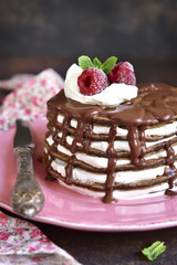 Chocolate pancakes with mascarpone and chocolate sauce.
