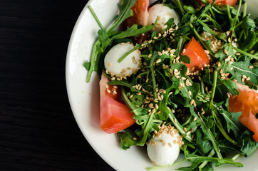 Fresh, summer salad with arugula leaves