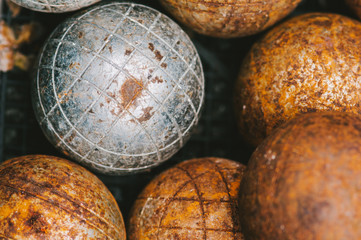 selection of Boule balls in a box