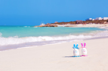 Easter, Easter eggs on the beach, ocean, sea