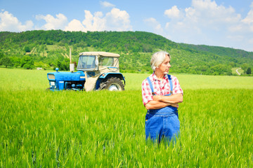 Farmer Standing In A Field