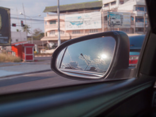 Traveling, rear view mirror road view