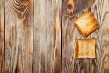 Toast on a rustic wooden background