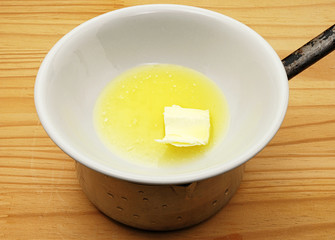 Melted butter in a double boiler