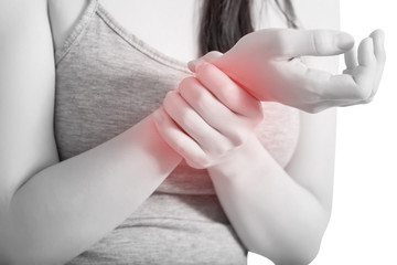 Acute pain in a woman wrist isolated on white background. Clipping path on white background.