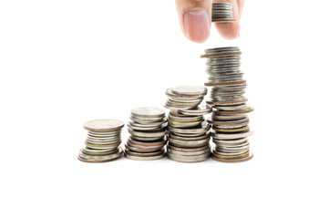 stack of golden coins and human hand