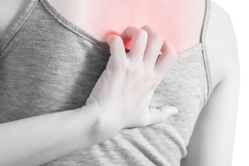 Scratching her back in a woman isolated on white background. Clipping path on white background