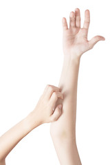 Scratching her arm in a woman isolated on white background. Clipping path on white background.