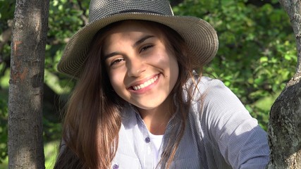 Smiling Teen Girl At Park