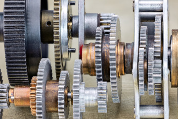 different metal mechanical industrial cogwheels macro view