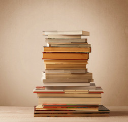 A stack of books with vintage background