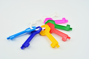 Plastic color keys on white background