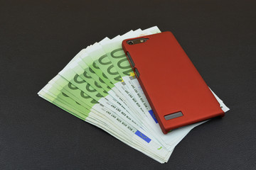 European banknotes with red phone