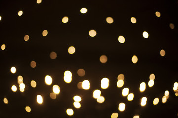 Effect golden bokeh defocused twinkling lights