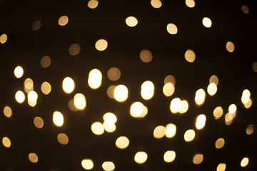 Golden bokeh on black background