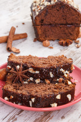 Gingerbread or dark cake with chocolate, cocoa and plum jam, delicious dessert