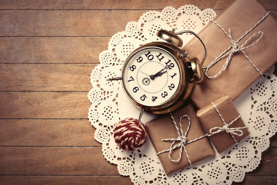 gifts, ball and clock on napkin