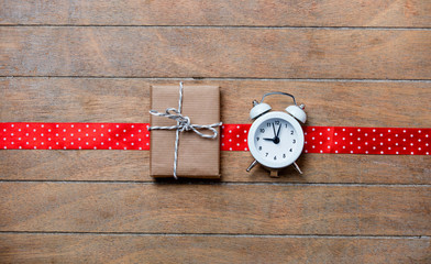 gift, ribbon and clock