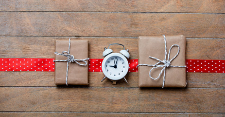 gifts, ribbon and clock